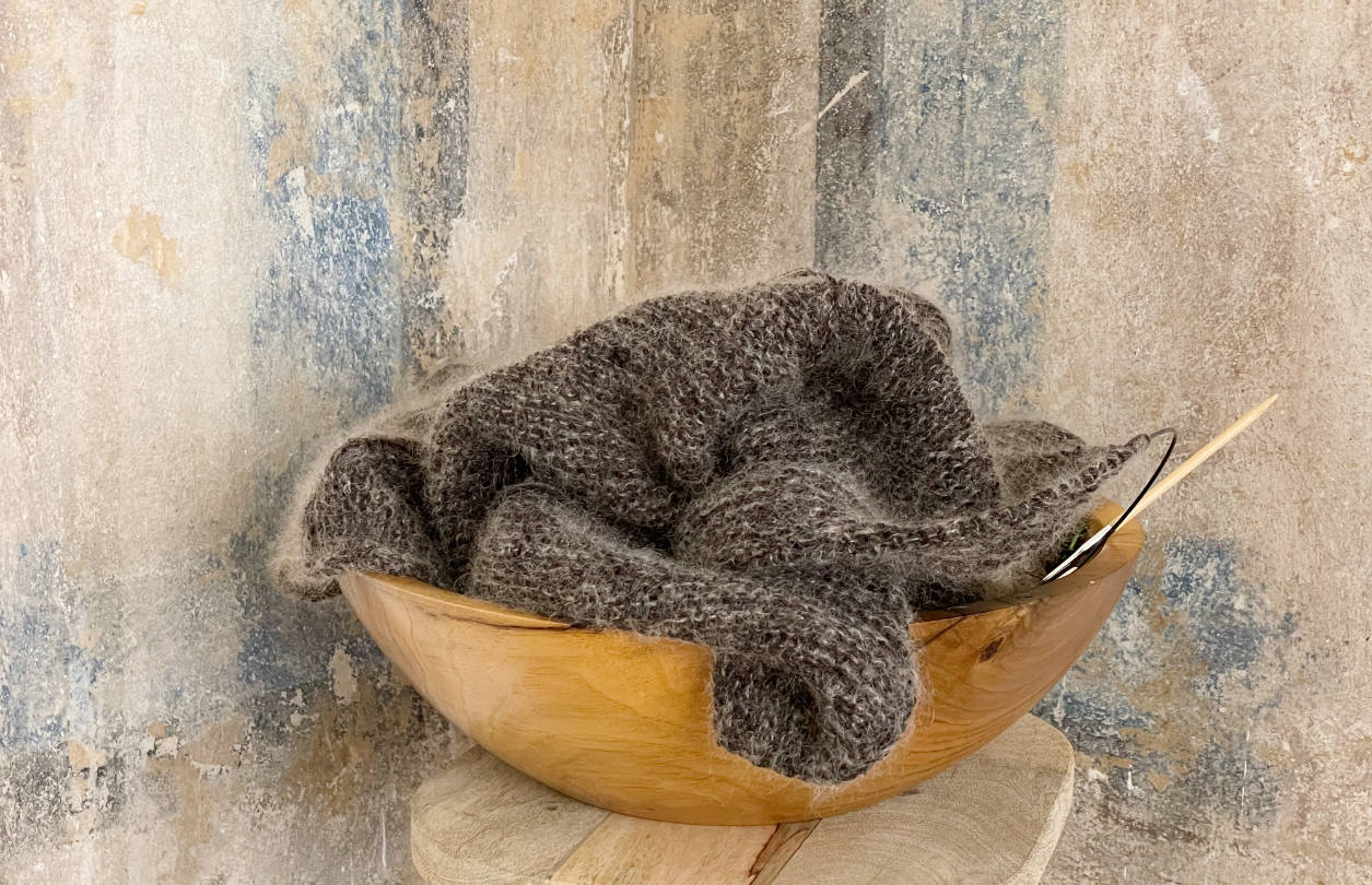knitting in a wooden bowl