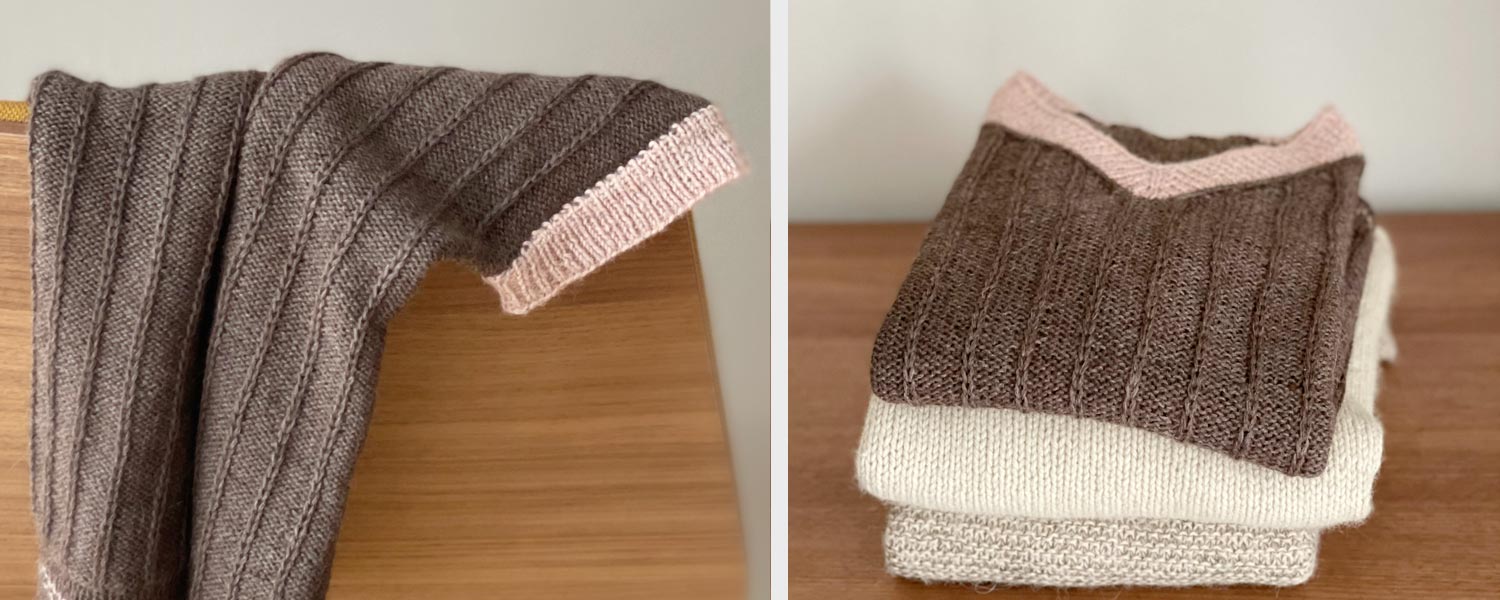 Ein handgestrickter Alpakapullover über einer Stuhllehne